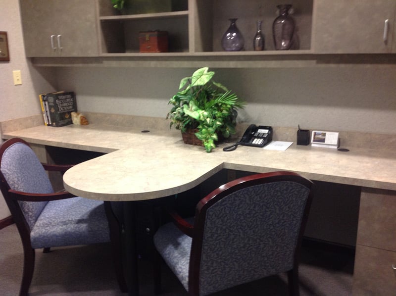A desk and chairs office {PRACTICE_NAME}